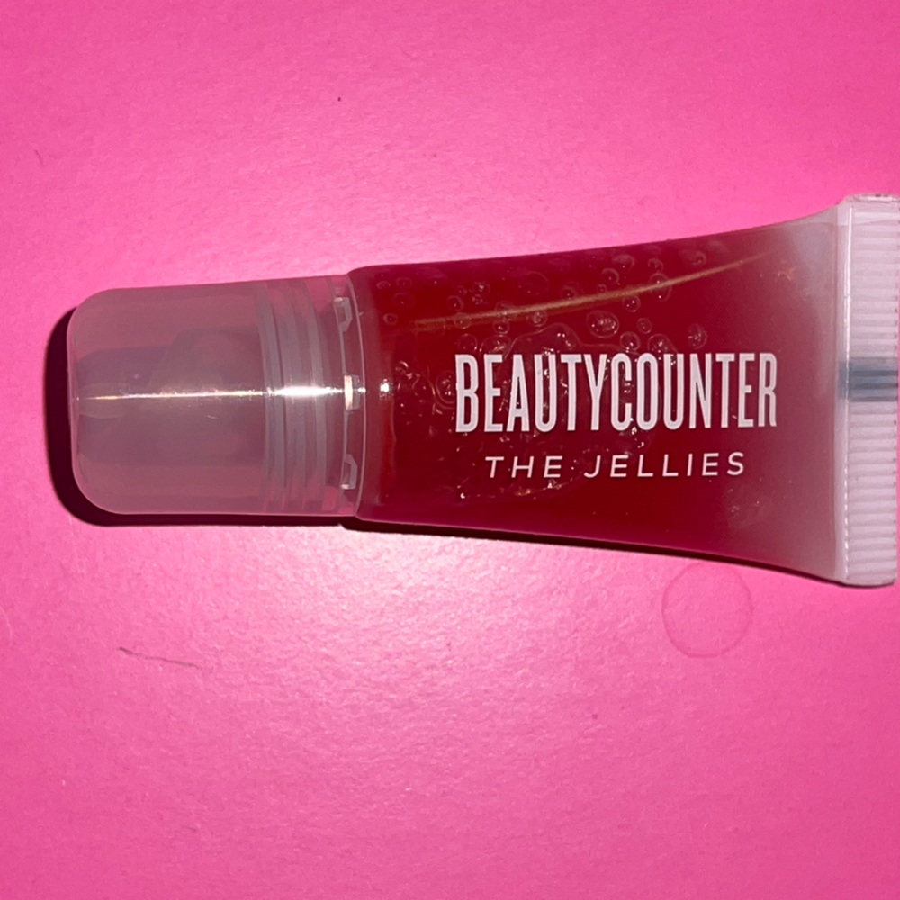 BEAUTYCOUNTER JELLIE LIP GLOSS in RED PEAR. (BRAND NEW!!!)